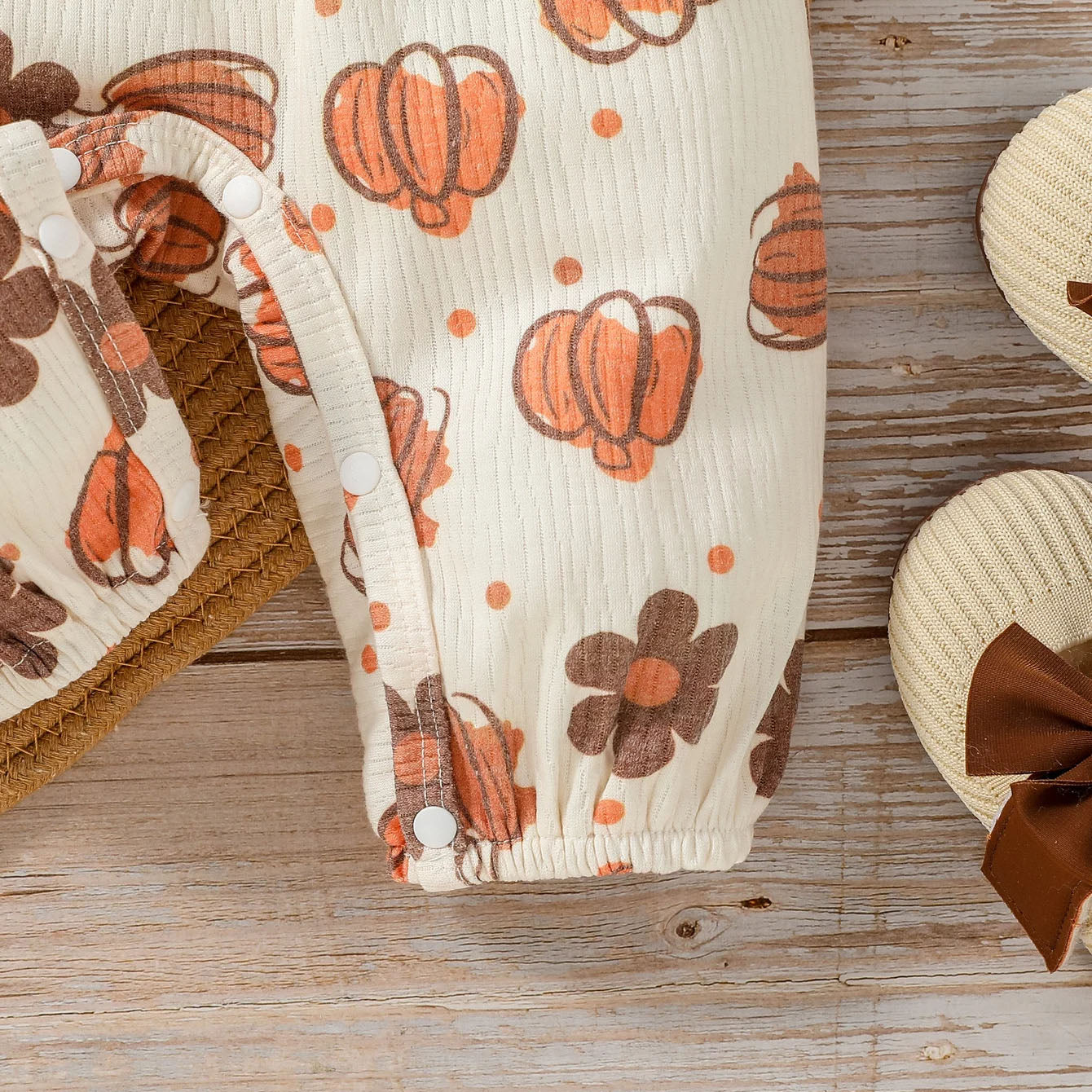 Graceful Pumpkin and Floral Printed Baby Jumpsuit