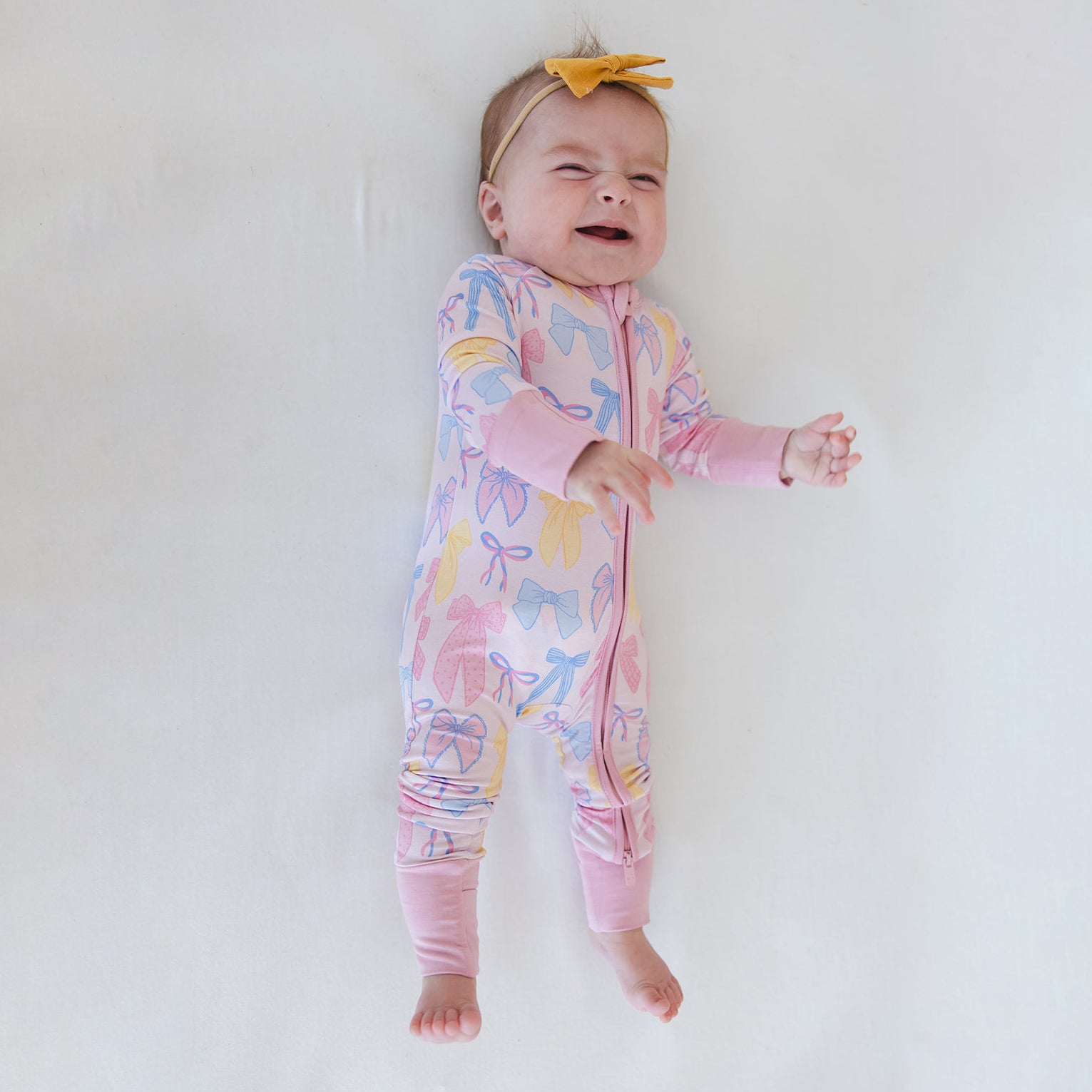 Cheerful Bow Printed Zipper Baby Girl Jumpsuit