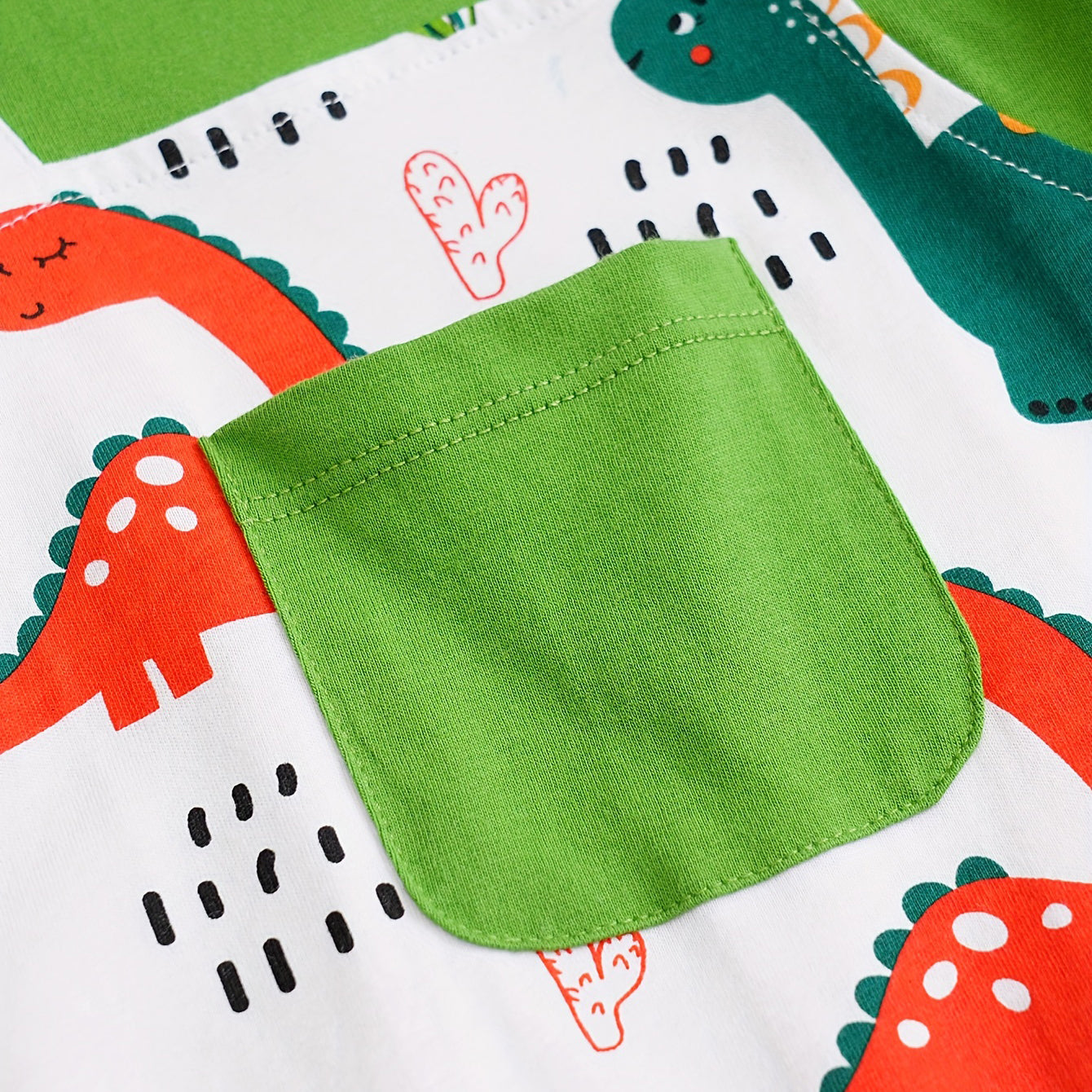 Mono de bebé de manga larga con estampado de dinosaurio fresco