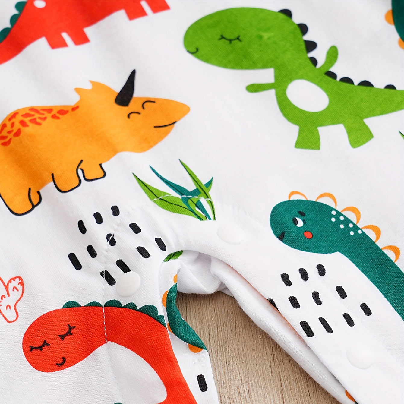 Mono de bebé de manga larga con estampado de dinosaurio fresco