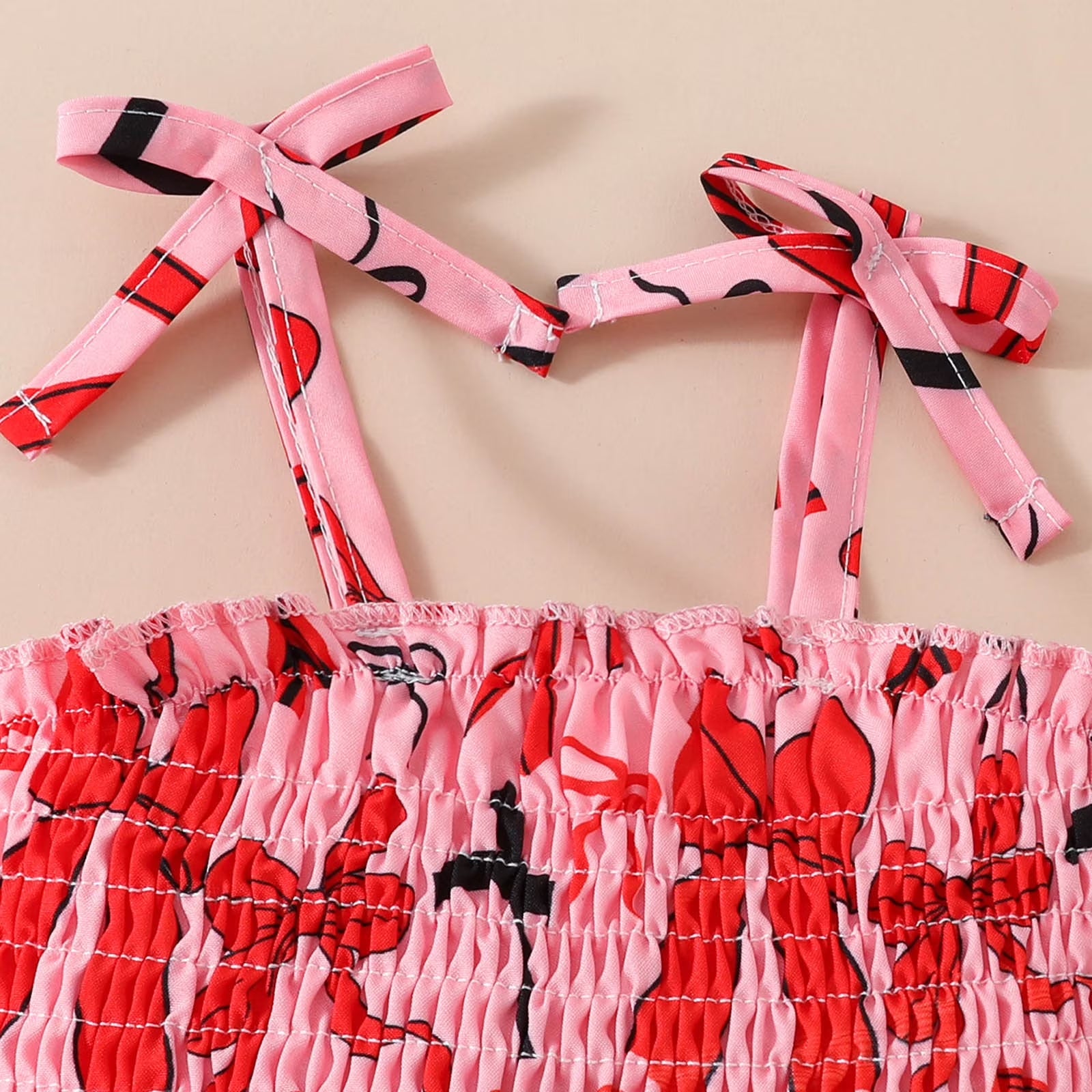 2PCS Vibrant Bow Print Sleeveless Baby Romper