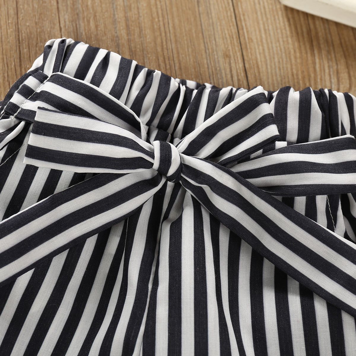 Ruffled Bodysuit and Striped Belted Pants