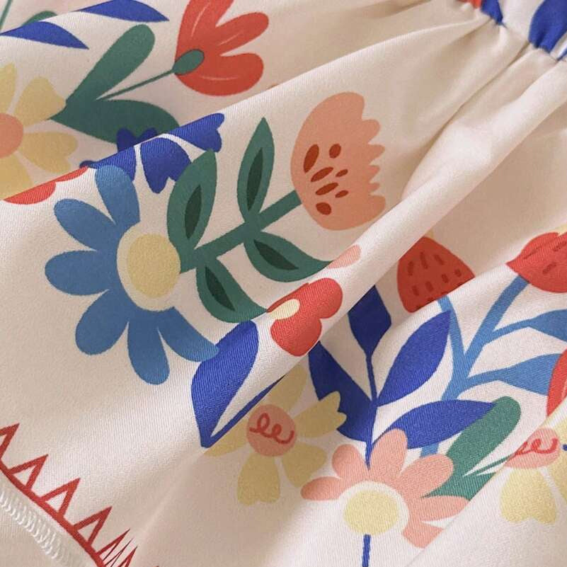 2PCS Whimsical Floral Print Flutter Sleeve Baby Romper