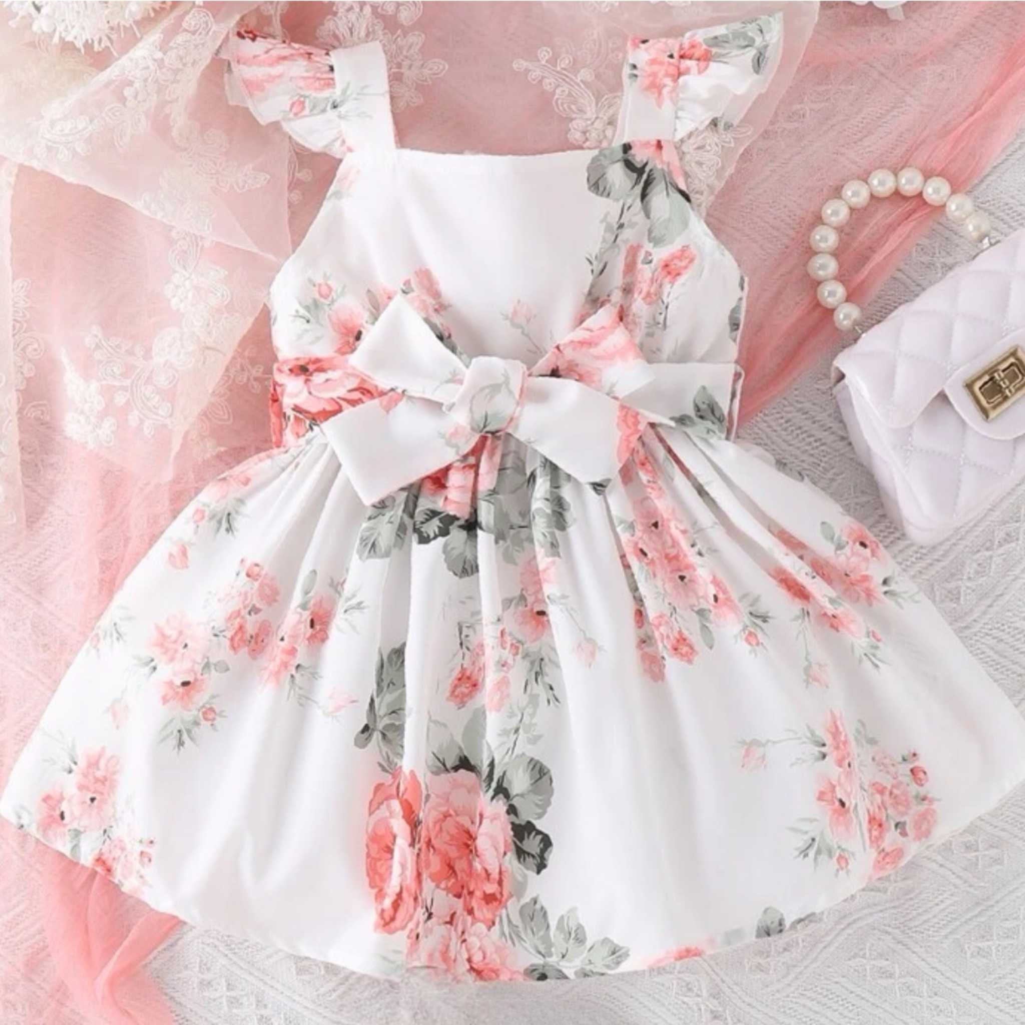 Vestido sin mangas para bebé con estampado floral bonito